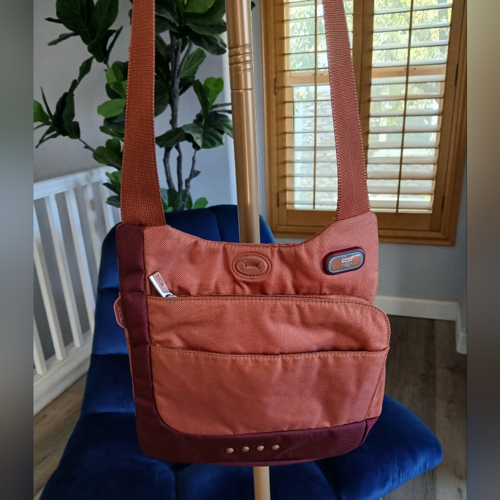Tumi T-Tech Nylon McKenna Crossbody Bag in Burnt Orange. 5132CND - Picture 2 of 11